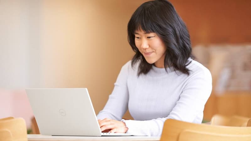 Microsoft 365 user working at a laptop, 2026 pricing update